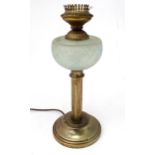 A table lamp formed as an oil lamp. Approx. 18" high Please Note - we do not make reference to the