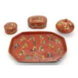 Four Indian / Kashmiri papier mache lacquered dressing table items comprising three lidded pots