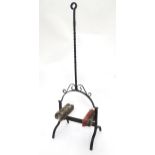 A cast iron boot scrapper on stand with handle and two brushes. Approx. 42" high Please Note - we do