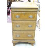 A 20thC mahogany small chest of drawers with brushing slide above three drawers, drawer fronts