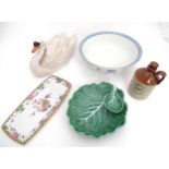 A quantity of assorted ceramics to include a large model of a swan, a cabbage leaf dish, a tray with