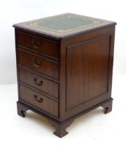 A mahogany leather topped filing cabinet / pedestal . Approx 30" high x 21" wide x 24" deep Please