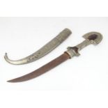 A Khanjar dagger and scabbard Please Note - we do not make reference to the condition of lots within