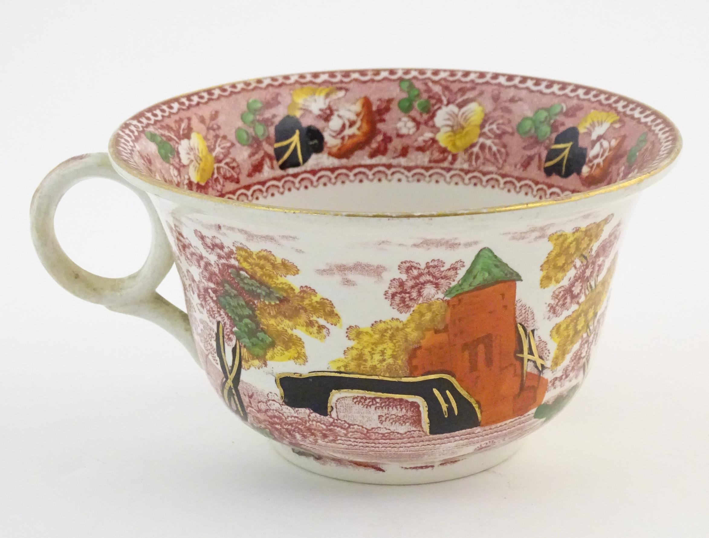 An oversized Burslem cup and saucer decorated with a bridge and tower in a landscape with the - Image 7 of 11