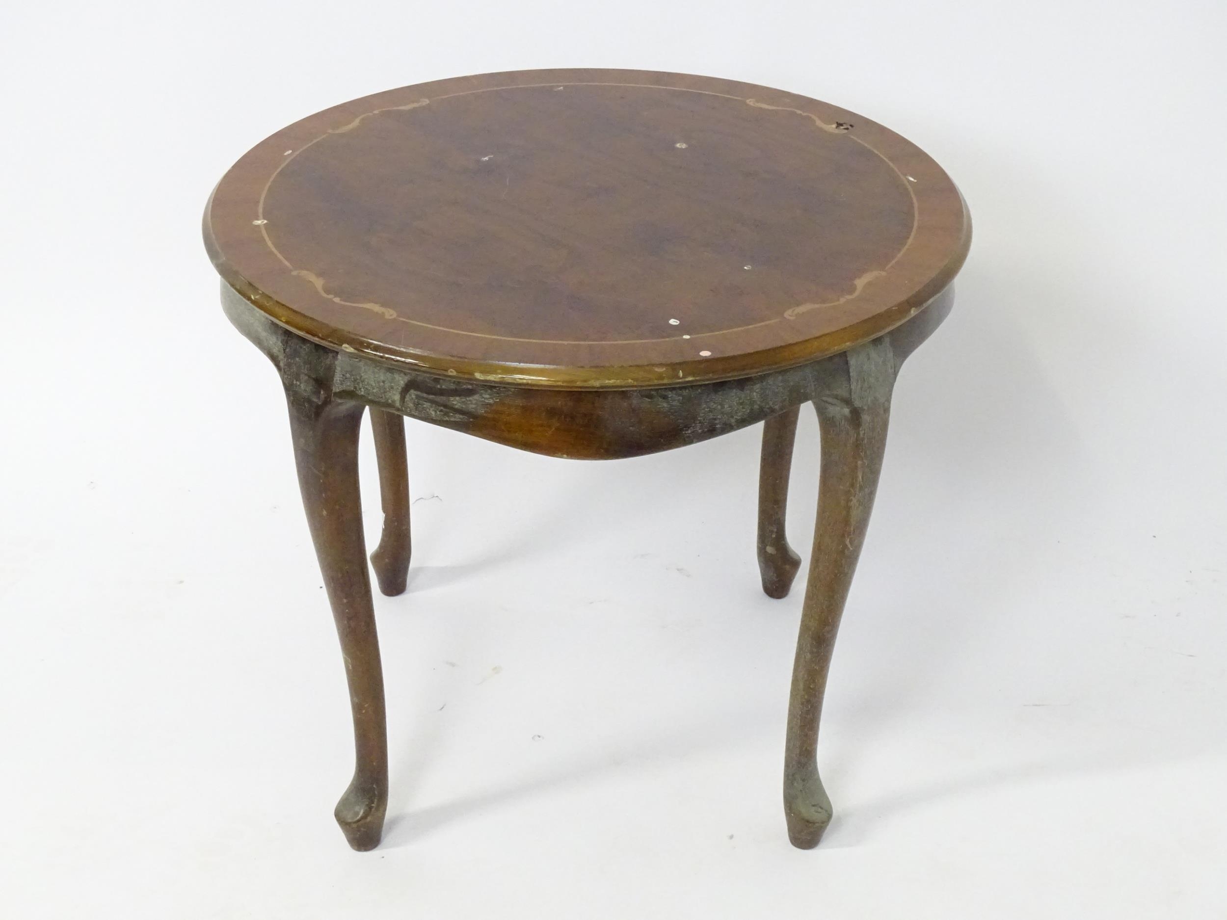 A late 20thC inlaid occasional table. Approx. 21 1/2" high Please Note - we do not make reference to - Image 3 of 5