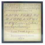 A late 19thC sampler by Rose Frost, age 11, 1894, depicting the alphabet in various fonts. Approx.