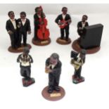 A quantity of Jazz band figures with various musical instruments. Largest approx. 5 1/2" Please Note