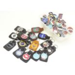 A quantity of car / automobile keyrings to include Mercedes Benz, Vauxhall, SAAB, Aston Martin, etc.