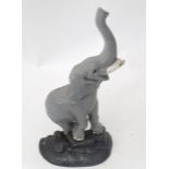 A cast iron door stop / door porter formed as an elephant Please Note - we do not make reference