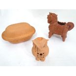 Terracotta tea light holders formed as a horse and an owl together with a German / Austrian
