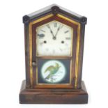 An American Kipper mantel clock with a glazed door and bird illustration. Approx. 16 1/2" high x