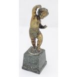 A cast brass model of a cherub on a marble base. Approx. 10 1/2" high Please Note - we do not make