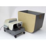 A Paximat slide projector Please Note - we do not make reference to the condition of lots within