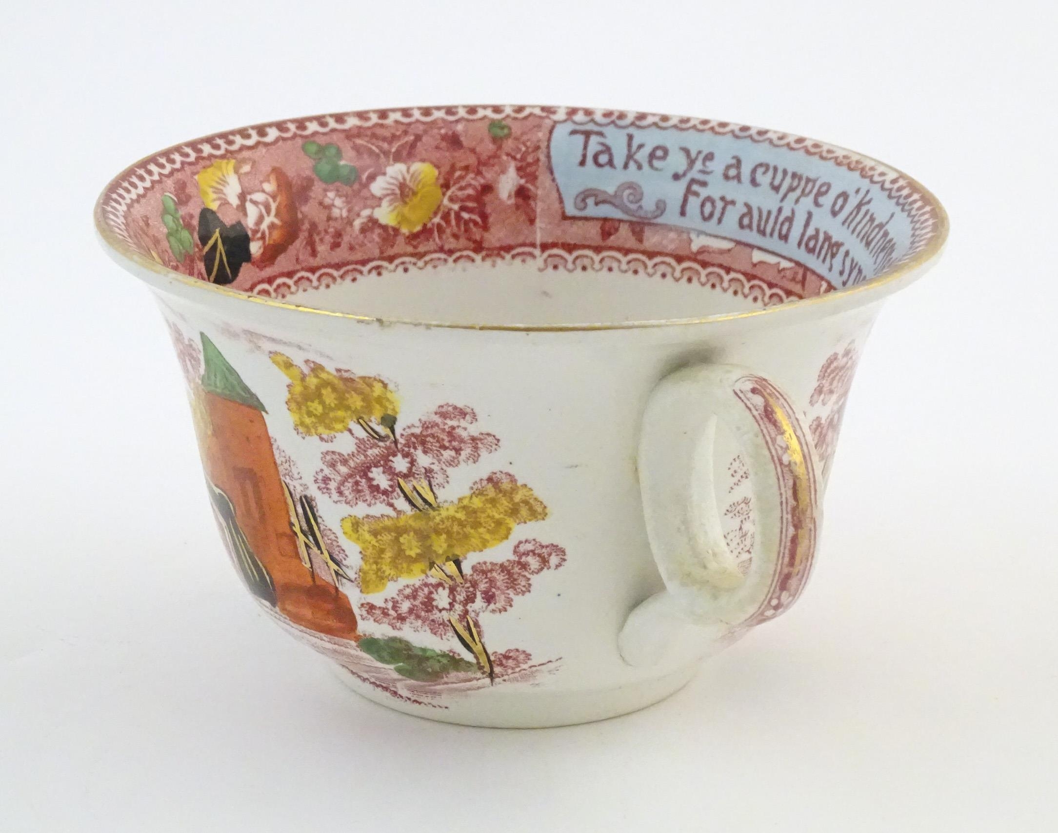 An oversized Burslem cup and saucer decorated with a bridge and tower in a landscape with the - Image 6 of 11