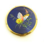A 20thC Stratton compact with interior mirror, the lid with butterfly and flower decoration. Approx.