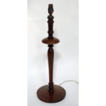 An Edwardian turned mahogany table lamp with boxwood inlay. Approx. 24 1/2" high, base approx. 8"
