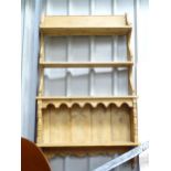 A pine plate rack. Approx. 43" 1/2" high x 26" wide Please Note - we do not make reference to the