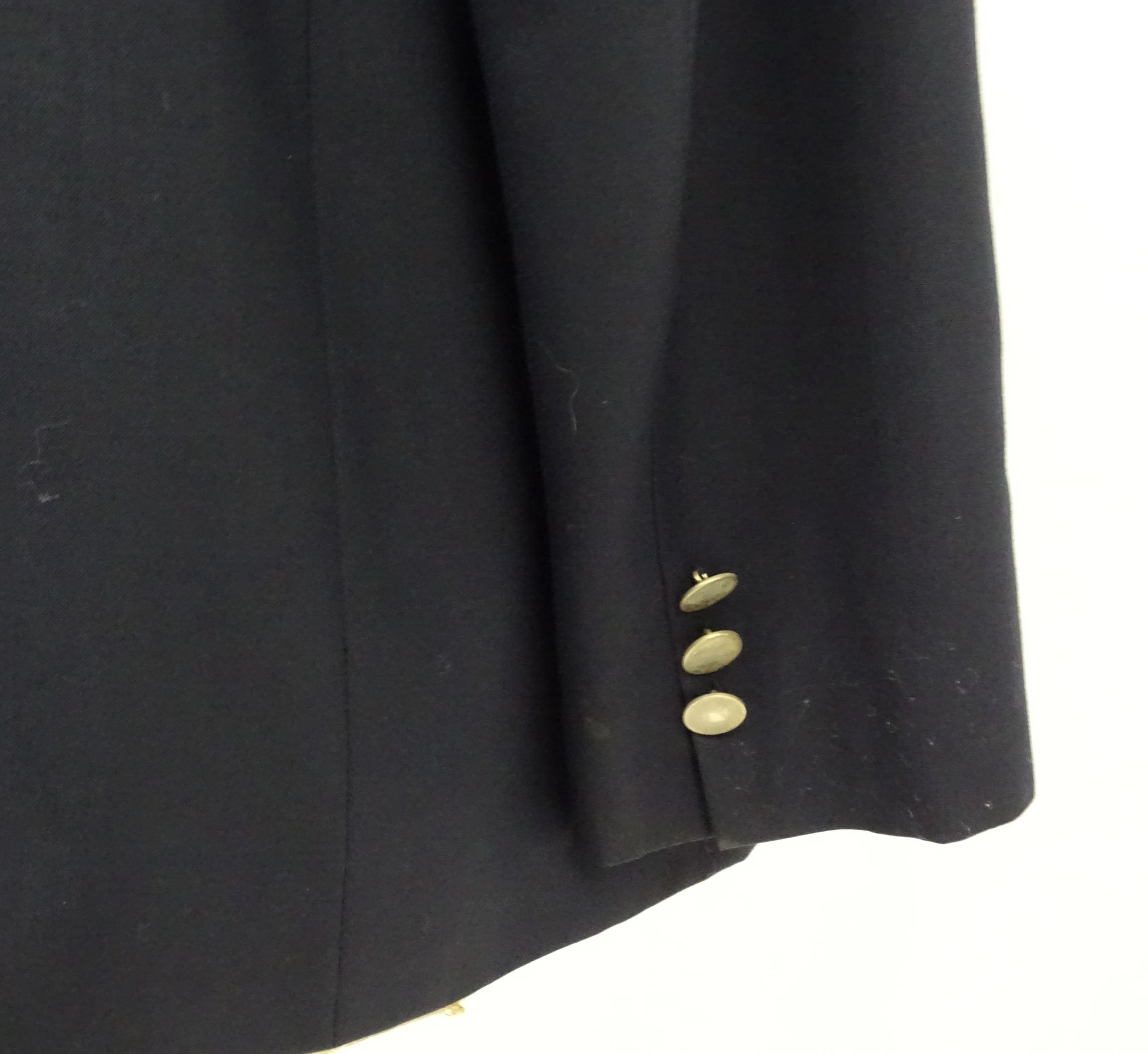 A navy blue bespoke suit with tapered trousers and metal button detail by 'Sam's Tailor' based in - Image 13 of 17