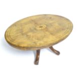 An oval coffee table / occasional table. Approx 41 1/2" wide x 31" deep x 19 1/4" high Please Note -