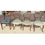 A set of four 19thC oak balloon back dining chairs with upholstered seats. Approx. 33 1/2" high (