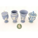 Five items of Wedgwood jasperware to include vases, pot and cover etc. Largest 8" high Please Note -