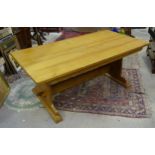 A large oak dining table. Approx. 30 1/2" high x 78" long x 41 3/4" wide Please Note - we do not