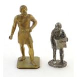 Two 20thC cast figures, comprising a model of the Cries of London figure Organ Grinder and Monkey,