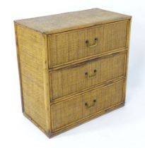A mid 20thC chest of drawers with bamboo and rattan detail. Approx. 30" high Please Note - we do not