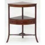 A Georgian mahogany corner washstand with boxwood inlay, the lower tier with single drawer.