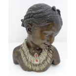 A cast plaster bust of a child, together with a Middle Eastern necklace. Approx. 13" high Please
