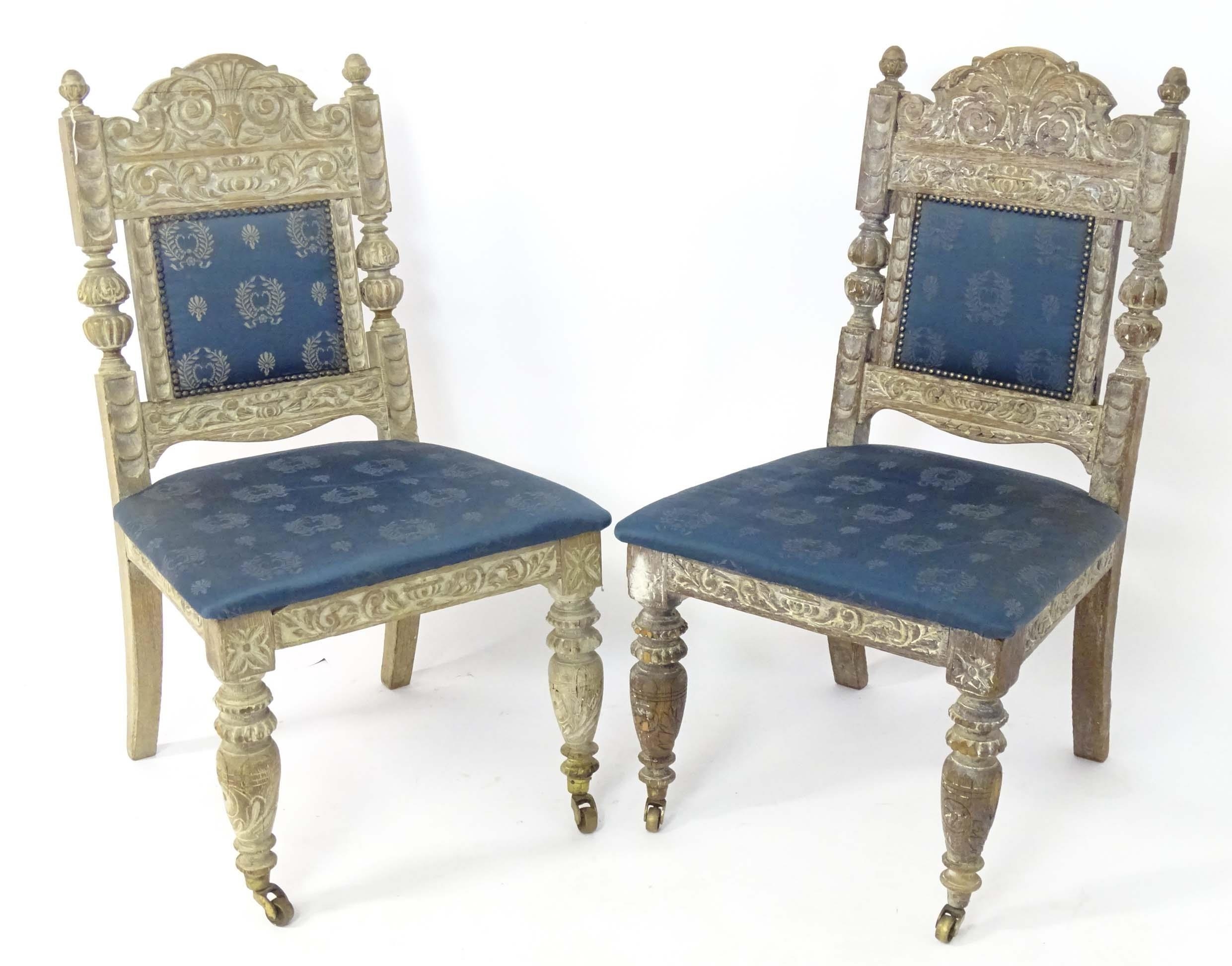 Pair limed oak and upholstered dining chairs. Approx. 39" tall Please Note - we do not make