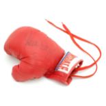 A signed Lonsdale boxing glove Please Note - we do not make reference to the condition of lots
