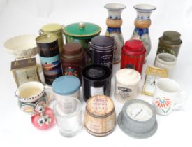 A box of miscellaneous items to include tins, ceramics, clocks, etc. Please Note - we do not make