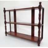 Three tier wall hanging shelves. Approx 30" wide x 21 1/2" high x 6 1/2" deep Please Note - we do