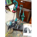 A quantity of assorted electric tools to include a tile cutting saw, angle grinder, etc. Please Note