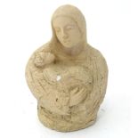 A carved model of Madonna and child. Approx. 8" high Please Note - we do not make reference to the
