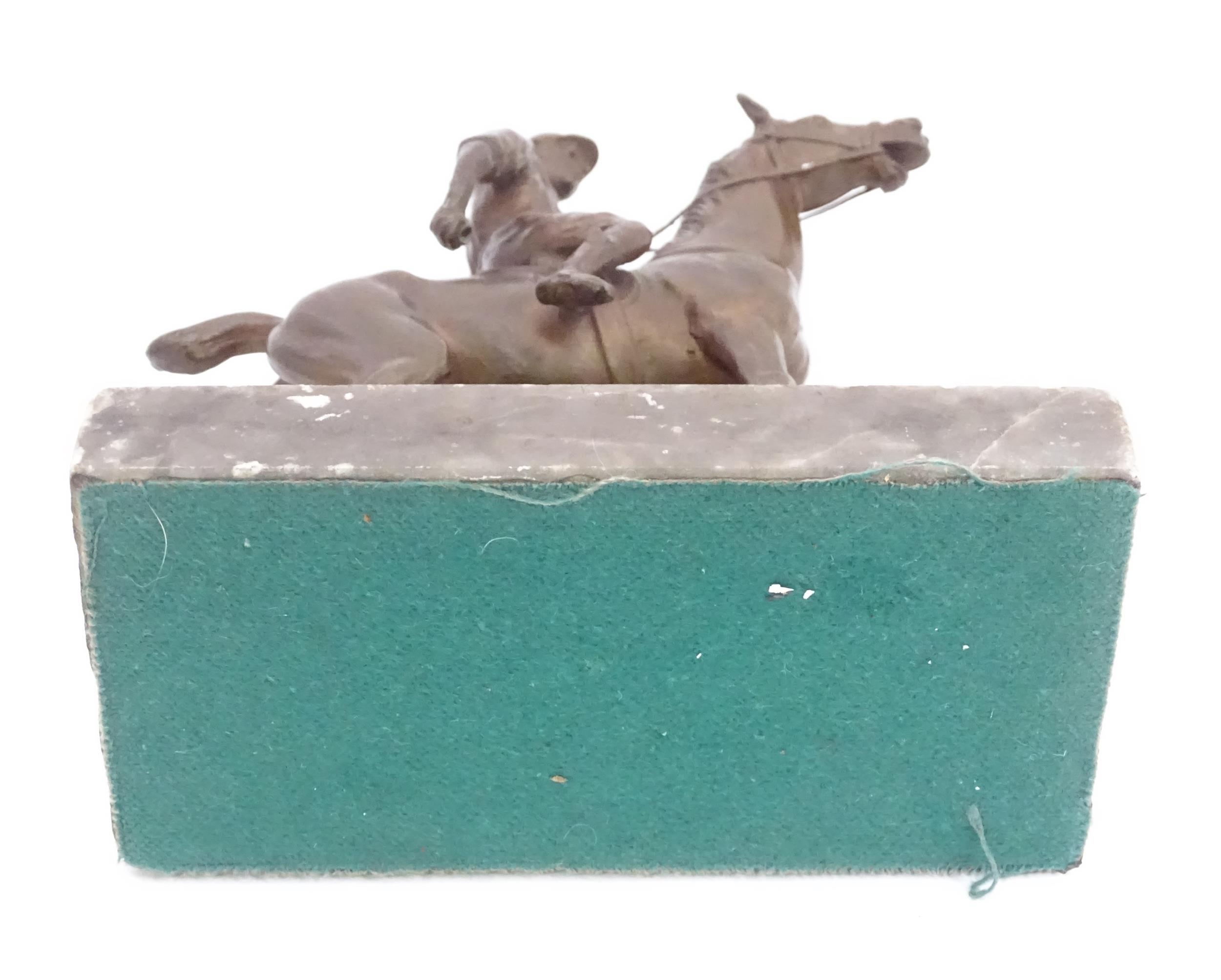 A 20thC cast sculpture modelled as a jockey on horseback, upon a marble base. Approx. 5 1/2" high - Image 2 of 5