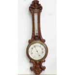An aneroid barometer by A Franks of Manchester. Approx. 34" high Please Note - we do not make