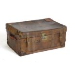 A late 19th / early 20thC leather travelling trunk with two carry handles. Approx. 14" x 32" x 21"