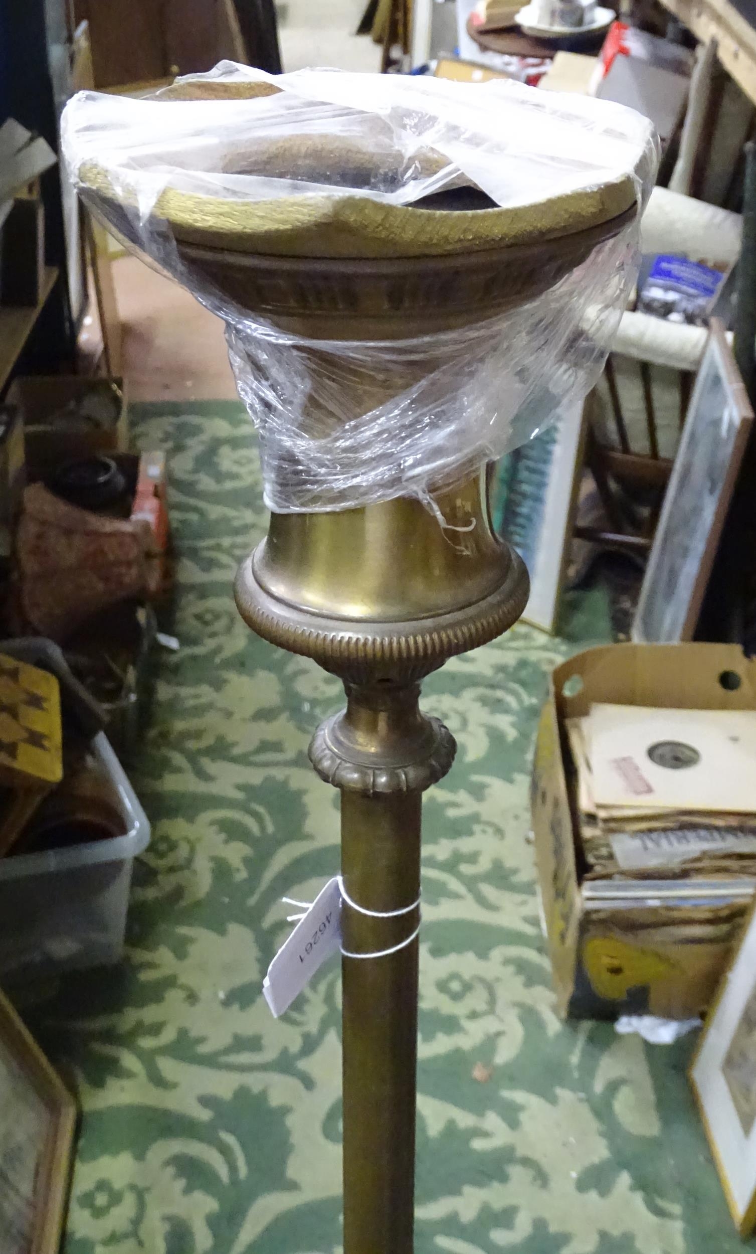 A weighted brass standard lamp with a circular base. Approx. 63" high Please Note - we do not make - Image 2 of 3