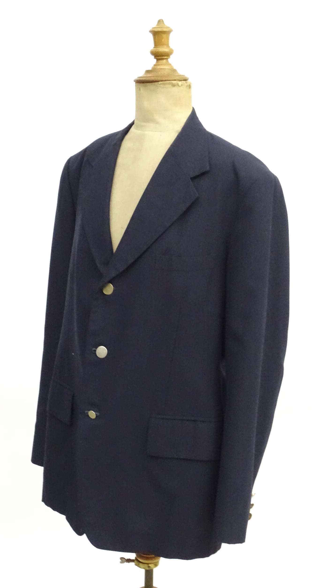 A navy blue bespoke suit with tapered trousers and metal button detail by 'Sam's Tailor' based in - Image 8 of 17