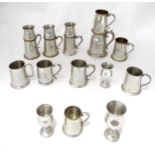A quantity of pewter mugs, tankards and goblets, some with inscriptions relating to rowing.