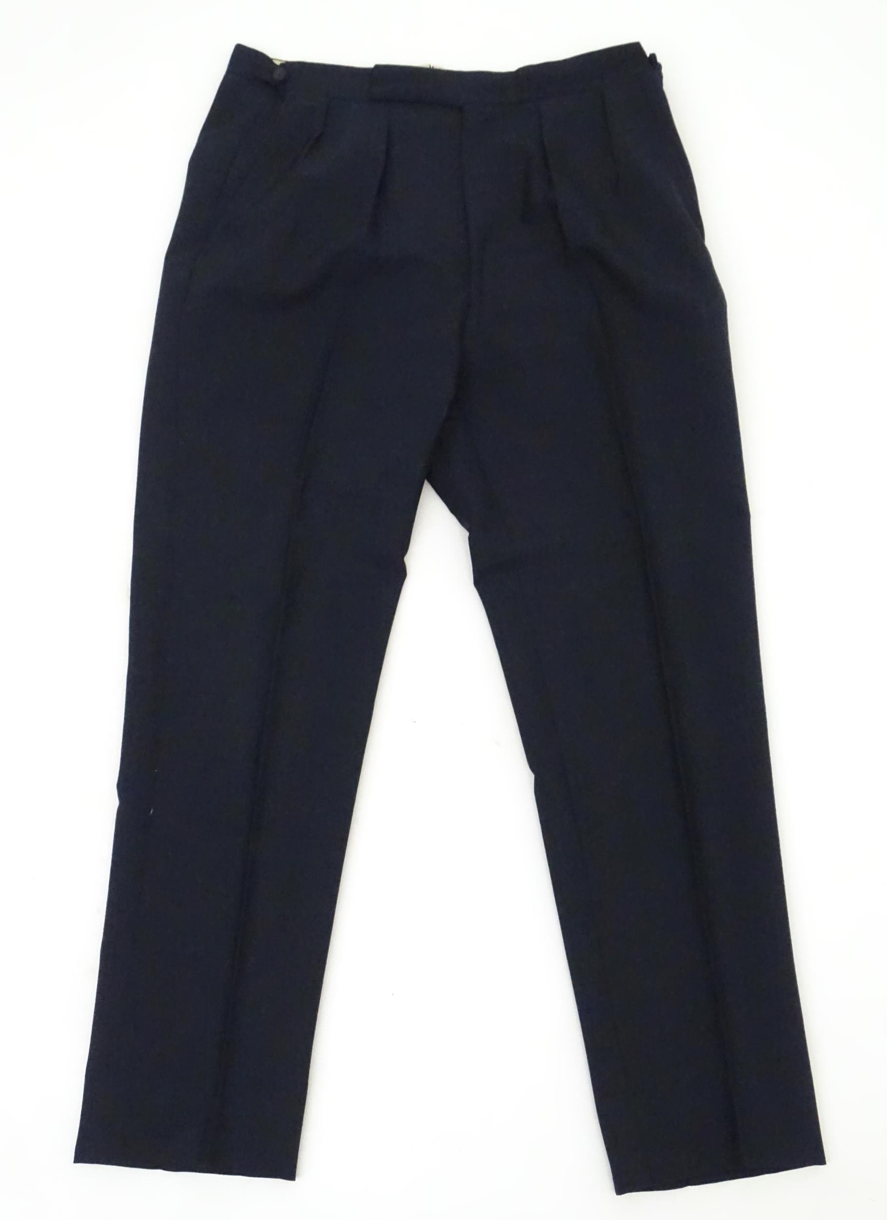 A navy blue bespoke suit with tapered trousers and metal button detail by 'Sam's Tailor' based in - Image 3 of 17