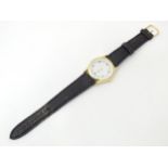 A gentleman's wristwatch with Japanese movement and leather strap. The case approx 1 1/4" diameter
