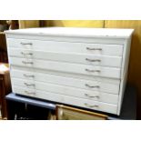 A white painted map / plan chest with 6 drawers. Approx. 28" high x 47" wide x 33 1/2" deep Please