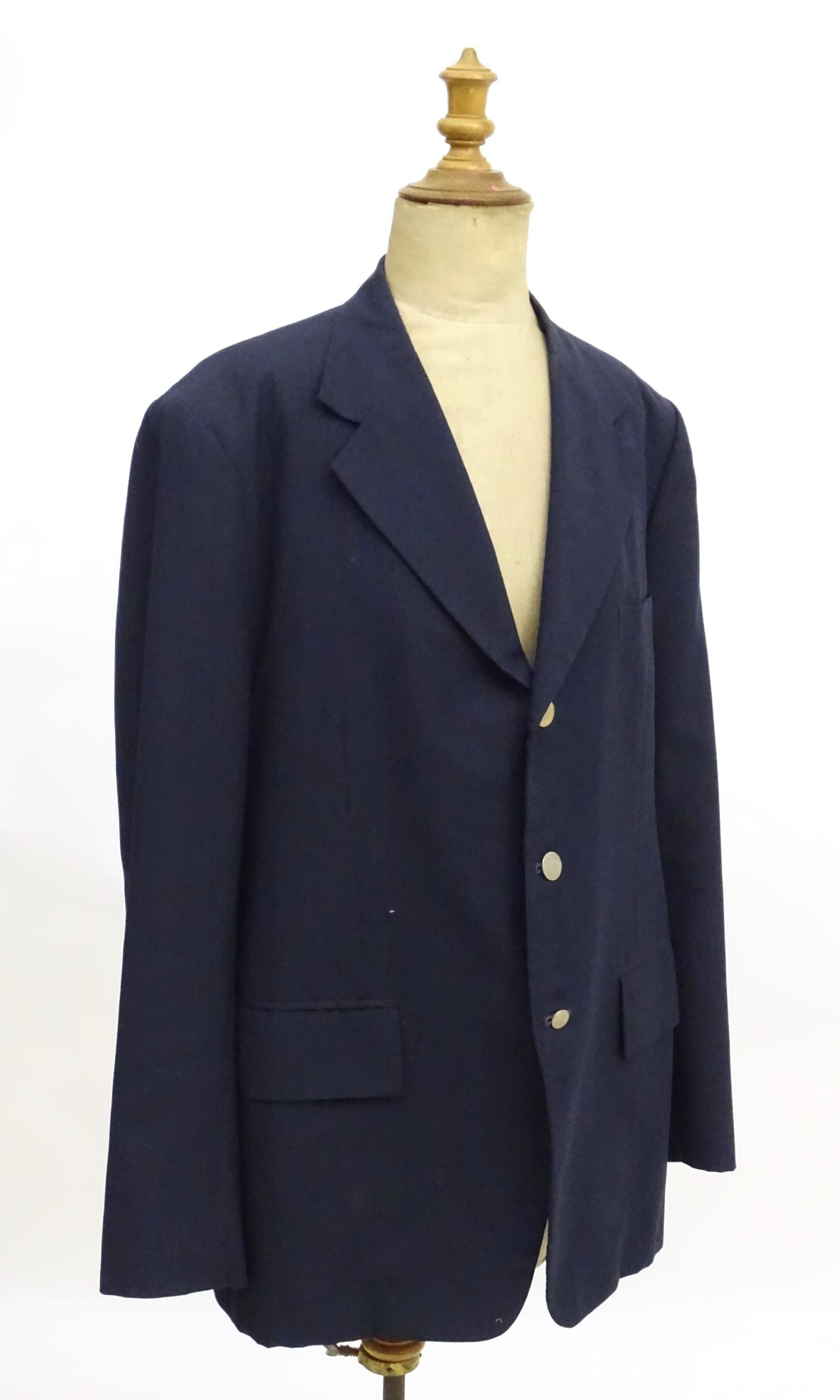 A navy blue bespoke suit with tapered trousers and metal button detail by 'Sam's Tailor' based in - Image 7 of 17