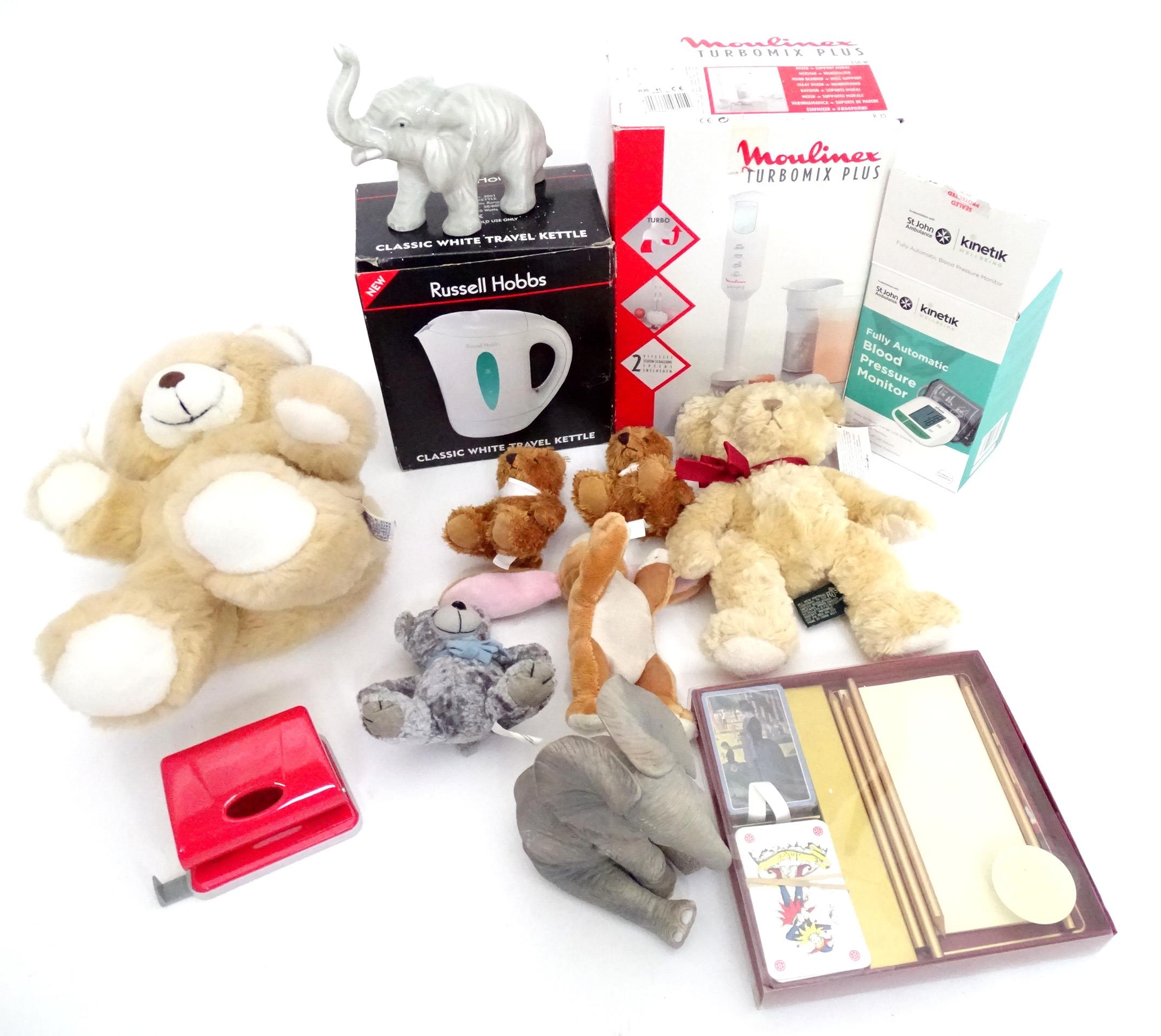 A quantity of miscellaneous items to include a blender, teddy bears, blood pressure monitor, etc.