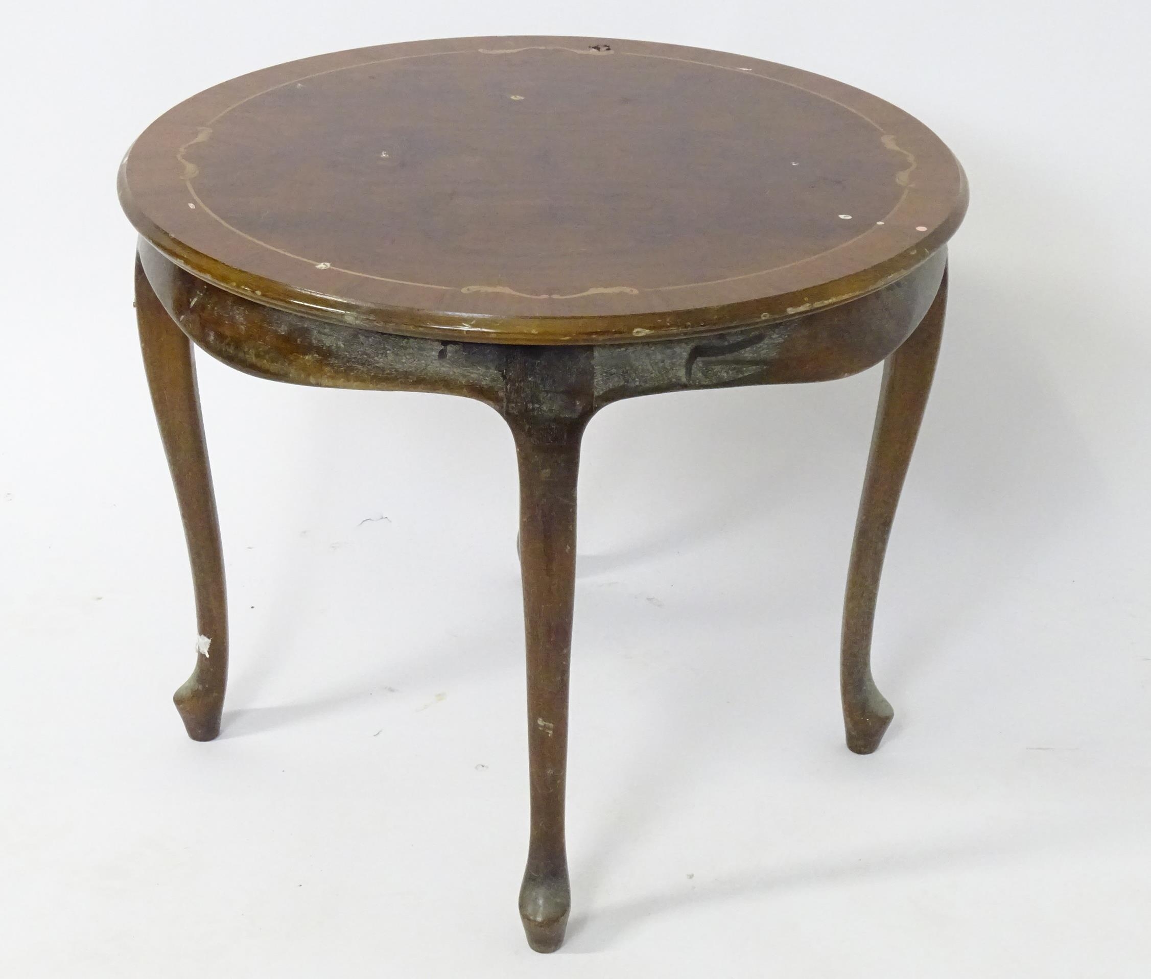 A late 20thC inlaid occasional table. Approx. 21 1/2" high Please Note - we do not make reference to - Image 4 of 5