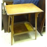 A mahogany two tier occasional table. Approx. 27" high x 24" wide x 17 1/2" deep Please Note - we do