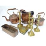 A quantity of brass and copper wares to include coal scuttle, kettles, copper pot, candlesticks,